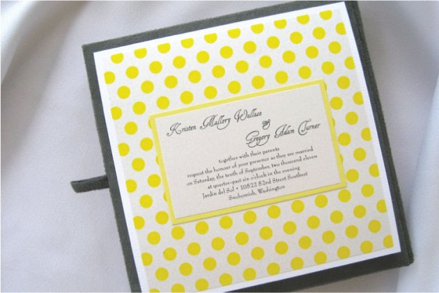 Yellow and gray polka-dotted wedding invitation in invitation box