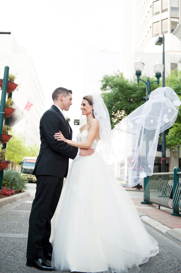Scott Craig Photography, Dogwood Blossom Stationery, Orlando weddings, bride and groom on street
