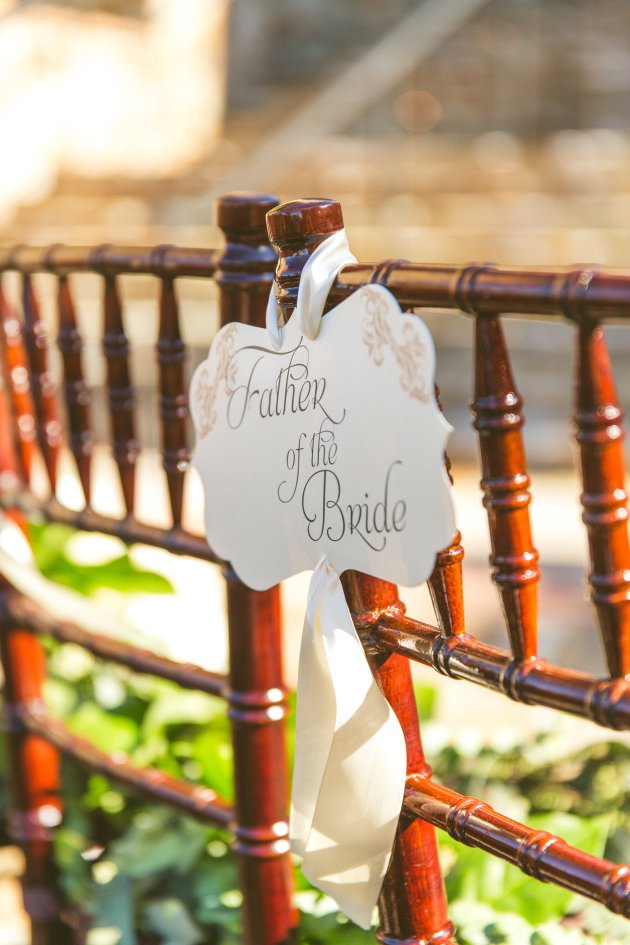 Bella-Collina-Concept-Photography-Fairytale-Wedding-Ideas-Chair-Signs-White-Floral-Shutterlife-Productions-Beautiful-Music-Dogwood-Blossom-Stationery-Event